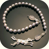 hand carved by anna biggs in wilmington delaware,dog clasp, fresh water pearl